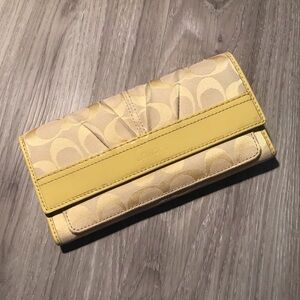 Coach wallet with patent leather trim